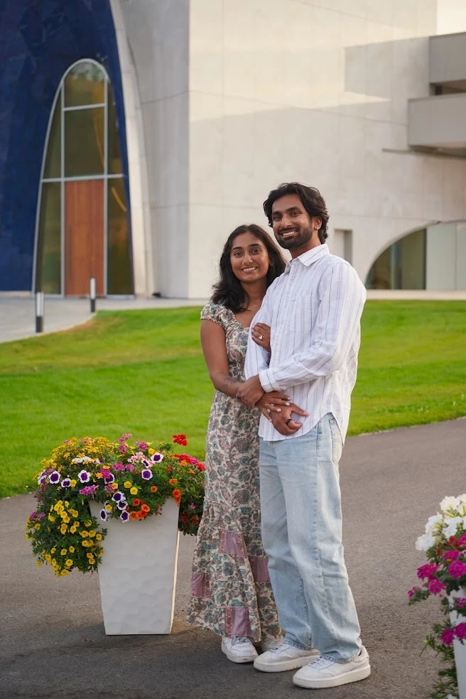 Neha and Shan standing arm in arm